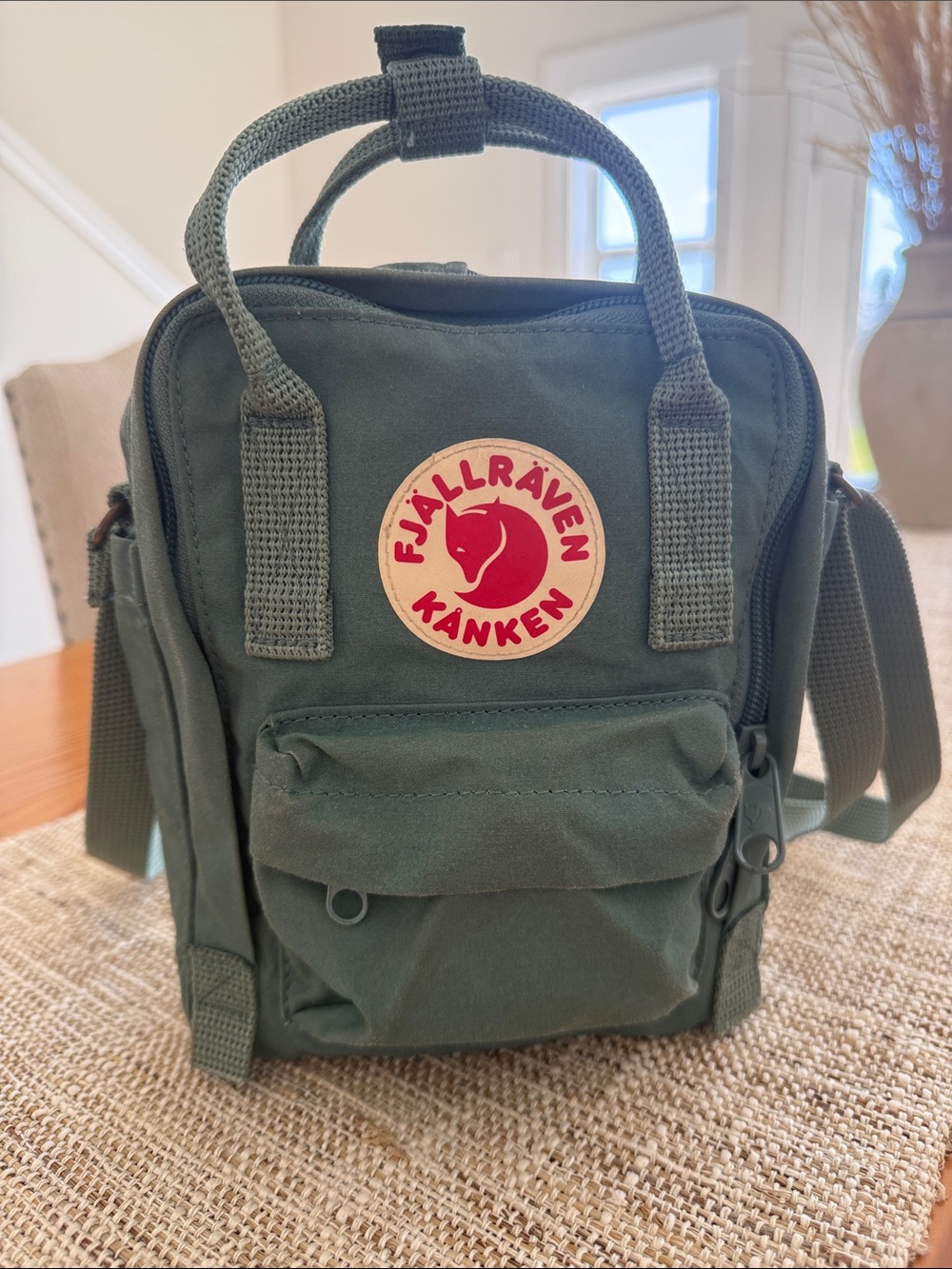Fjallraven Kånken Mini Sling Bag in Forest Green with Red Logo